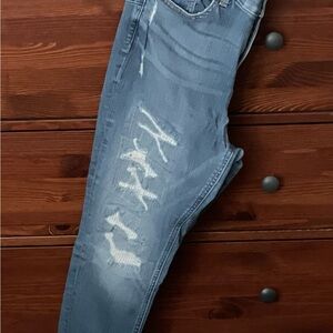 Torrid Bombshell Skinny Blue Jeans with Distressed Detailing